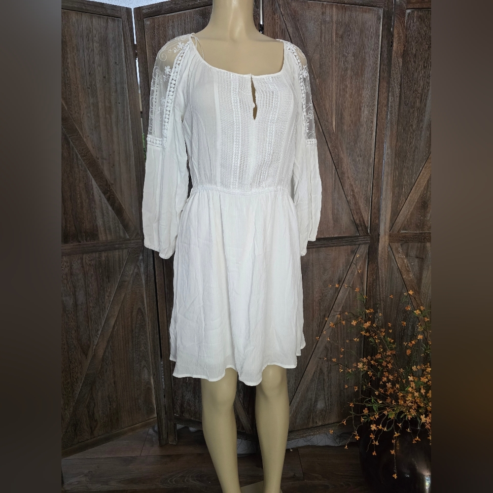 Elegant White Lace-Trimmed Dress